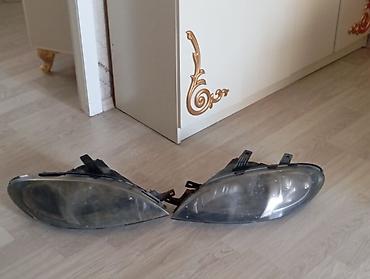 Ehtiyat hissələri: Məhsul: Avtomobil üçün ön faralar (cüt) Təsvir: - Şəkildəki kimi sağ — 1