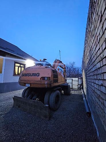 Экскаваторы: Экскаватор, Samsung, 1998 г., Колесный — 10