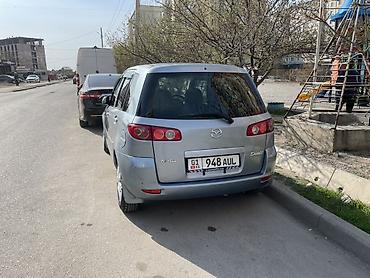 е 210: Mazda Demio: 2004 г., Автомат, Бензин, Хэтчбэк — 2