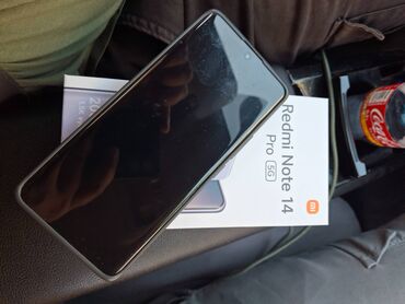 Xiaomi 14 Pro, 256 ГБ, цвет - Черный, 
 Отпечаток пальца, Две SIM карты, Face ID