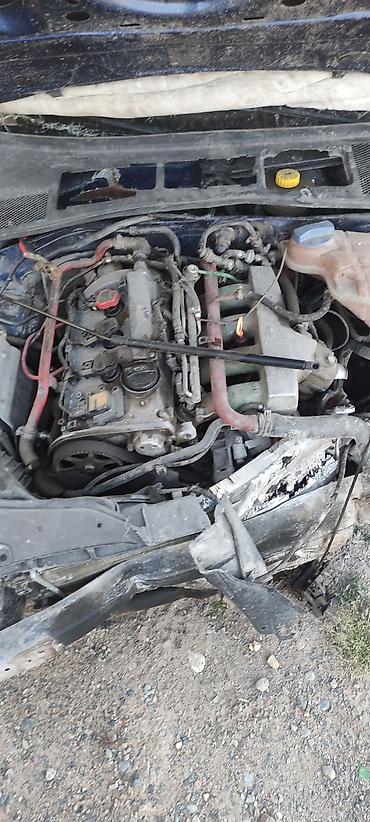 битую машину: Volkswagen Passat B5+(седан), тёмно‑синий цвет. Автомобиль после ДТП — 5