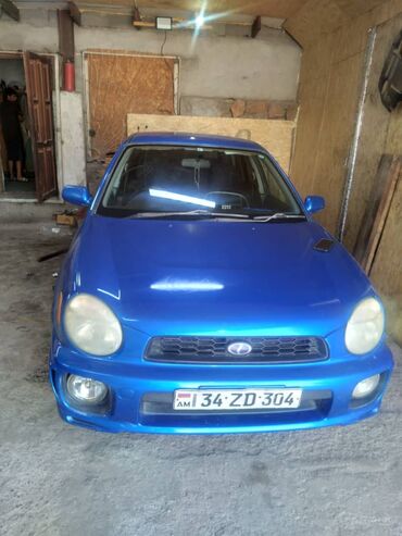 диск форестер: Синий хэтчбек Subaru Impreza (кузов примерно 2000–2002 гг., правый