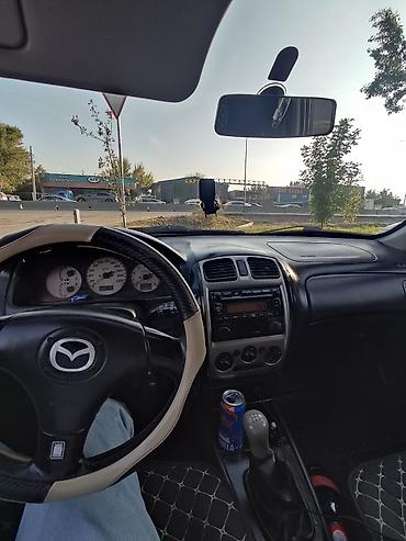 Mazda: Mazda 323: 2002 г., 1.6 л, Механика, Бензин, Универсал — 8