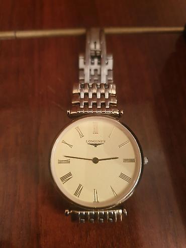 Işlənmiş qızılı rəngdə vaxtı ilə 2000 evroya alınıb ) Longines