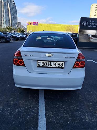 aveo ekran: Chevrolet Aveo: 1.4 l | 2010 il 100 km Sedan — 7