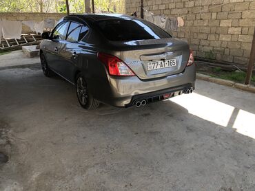 Nissan Sunny: 1.2 l | 2015 il Sedan