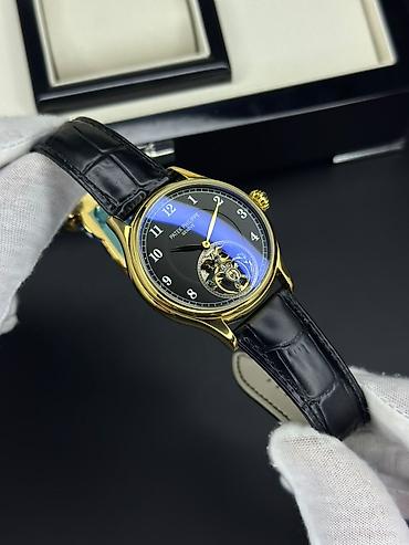 meta eynək: Patek Philippe mexaniki qol saatı – klassik dizayn və dəqiqlik - — 10