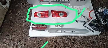 уплотнител: Задние запчасти для Mazda (на фото – Mazda демио второго поколения) — 1