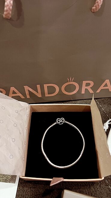 pandora браслет: Браслет от Pandora серебро 925 пробы 
с оформлением 2000с