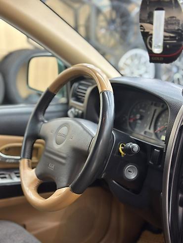 Продажа авто: Isuzu Axiom: 2002 г., 3.5 л, Автомат, Бензин, Внедорожник — 8