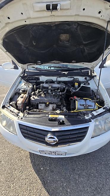 Nissan: Nissan Almera Classic: 1 l | 2007 il Sedan — 3