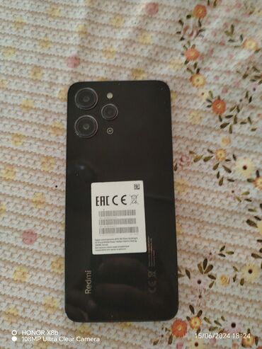 телефон флай фс 505 нимбус 7: Xiaomi Redmi 12, 256 ГБ, цвет - Черный, 
 Гарантия, Отпечаток пальца, С документами