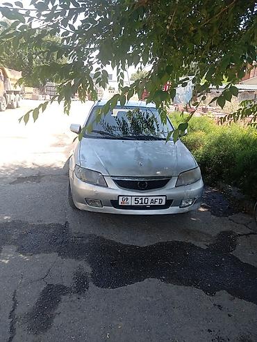 демио пороги: Mazda Familia: 2002 г., 1.6 л, Механика, Бензин, Универсал — 6