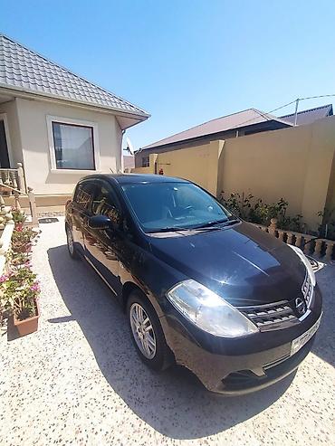 disk: Nissan Tiida hatchback - Kuzov: 5 qapılı hatchback, qara rəng - — 1