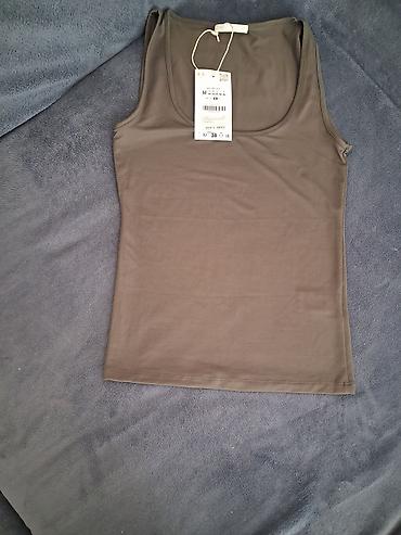 Qadın geyimləri: Qadın üçün sleeveless köynək (mayka) - Brend: Uniqlo - Model — 1