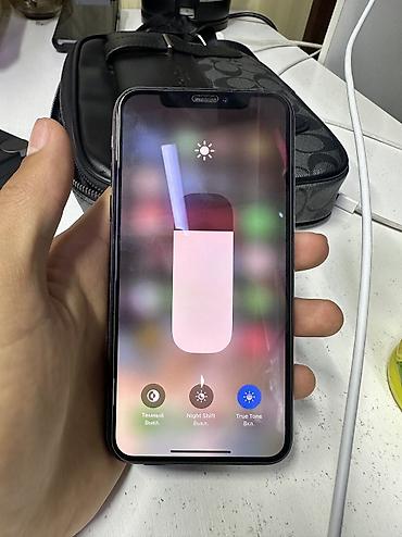 Уюлдук телефондор жана аксессуарлар: IPhone Xs, 64 ГБ, черный Характеристики: - Память: 64 ГБ - iOS — 3