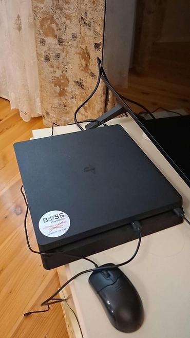 PlayStation 4 Slim oyun konsolu paketi - Model: PS4 Slim (qara rəng)