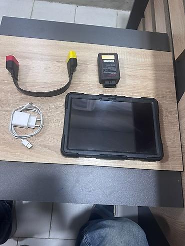 gence avtomobil: Huawei planşet və avtomobil diaqnostika avadanlığı komplekti. Planşet — 2