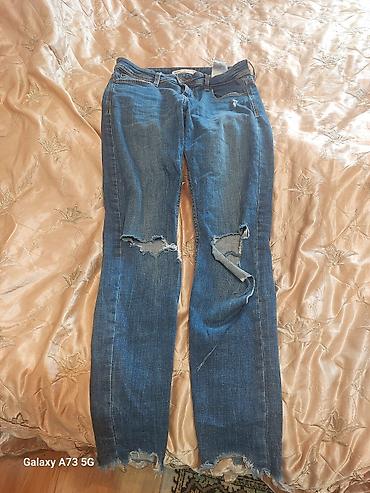 - Məhsul: Cins şalvar - Material: Klassik denim, orta tonda mavi -