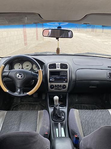 Mazda: Mazda 323: 2000 г., 1.8 л, Механика, Бензин, Хэтчбэк — 9