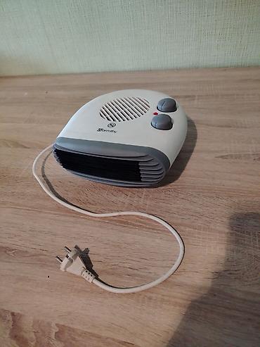 pulsuz video cat: Elektrik fan qızdırıcısı — Warmfly - Kompakt stolüstü dizayn, asan — 1