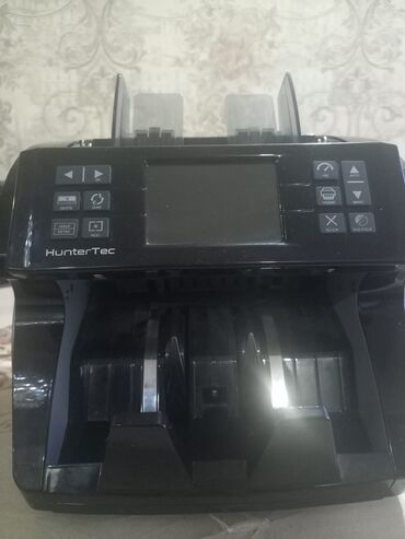Soyuducu avadanlığı: HunterTec markalı qara rəngli banknot sayma maşını. Bu model