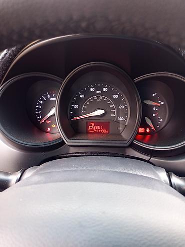 kia march: Kia Rio: 1.6 l | 2014 il Sedan — 2