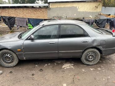 автомобиль смарт: Mazda 626: 1993 г., 2.2 л, Механика, Бензин, Седан