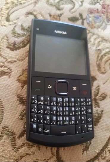 010 sim nomreler: Nokia X2 Dual Sim, Düyməli