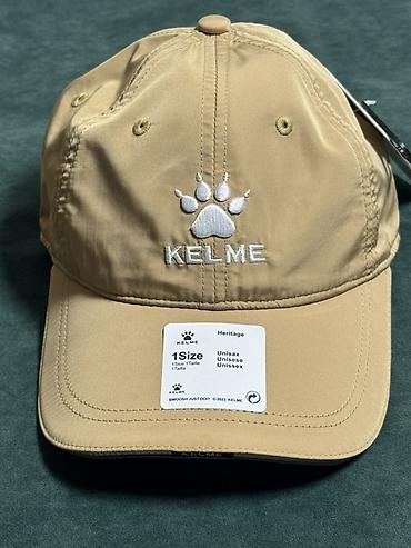 одежд: Кепка KELME Heritage, унисекс - Цвет: бежевый (песочный) - Логотип — 2