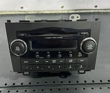 обмен на электро: Штатная автомобильная магнитола с 6‑дисковым CD‑ченджером Особенности — 1