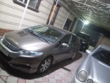 Honda: Honda Insight: 2010 г., 1.3 л, Вариатор, Гибрид, Седан