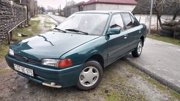 volkswagen 3 2: Mazda 3: 1.6 l | 1994 il Sedan