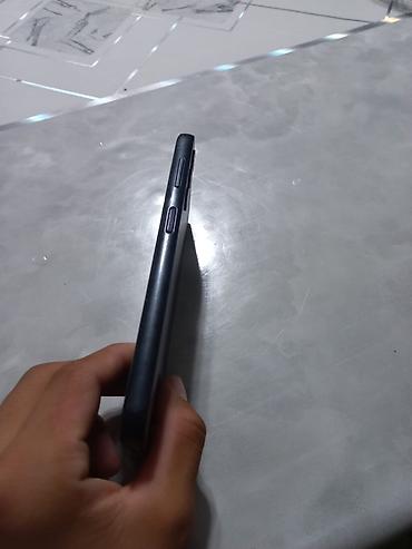 redmi 13 note pro: Смартфон Samsung (серия Galaxy A) в черном цвете. Ключевые — 5