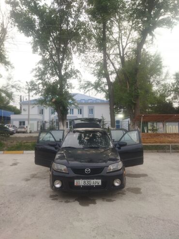 машина сервы: Mazda 323: 2001 г., 1.6 л, Механика, Газ, Хэтчбэк