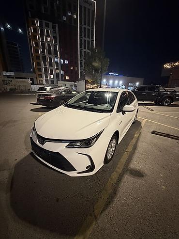 Toyota Corolla: 2020 г., 1.8 л, Вариатор, Гибрид, Седан at lalafo.kg Toyota Corolla: 2020 г., 1.8 л, Вариатор, Гибрид, Седан