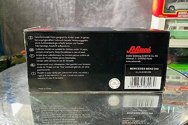 Avtomobil modelləri: Коллекционная модель Mercedes-Benz 200 W123 Hearse black 1982 Schuco — 27