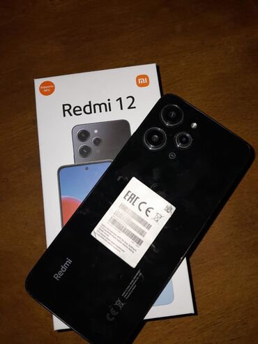 100 manatlıq telefonlar: Xiaomi Redmi 12, 128 ГБ, цвет - Черный, 
 Отпечаток пальца