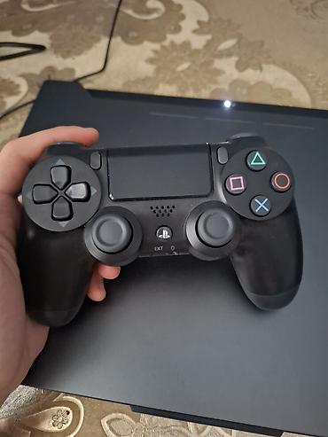 iphone 14 dubai: Sony DualShock4 a class 2 aydı alınıb çox az işlenib cızığı bele yoxdu — 1