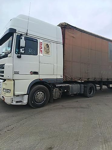 yuk maşnı: DAF XF dartqı (traktor) və tentli qoşqu • Marka/model: DAF XF • — 3
