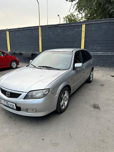 Mazda: Mazda 323: 2004 г., Хэтчбэк — 2