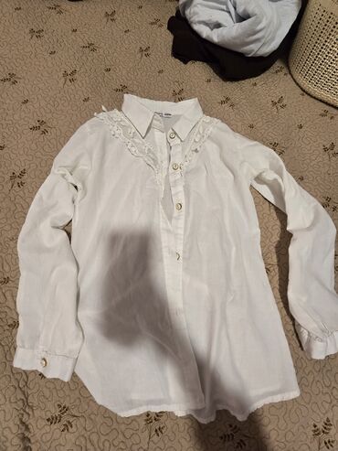 Qadın şalvarları: Bu dəstə müxtəlif üslublu dörd qadın şalvarı və bir qara ətək — 31