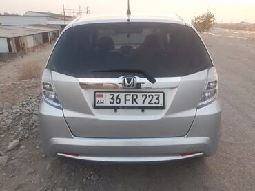 лейлек авто: Honda Fit: 2011 г., 1.3 л, Вариатор, Гибрид, Хетчбек