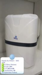 Su üçün kulerlər və dispenserlər: Damla su filtri – mətbəx üçün kompakt və qapalı korpuslu təmizləmə