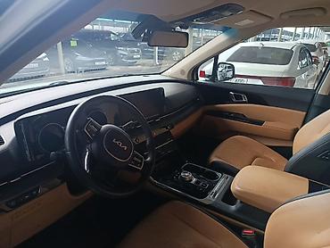 Kia: Kia Carnival: 2023 г., Минивэн — 8