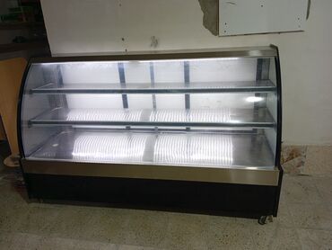 soyuducu isdenmis: Vitrin soyuducu cox az istifade olub soyutma rejimi var hetda buzladan