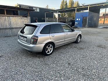 Mazda: Mazda 323: 2002 г., 1.6 л, Механика, Бензин, Универсал — 4