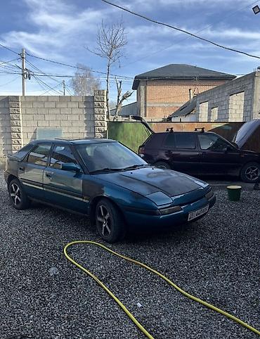 Mazda 323: 1992 г., 1.6 л, Механика, Бензин, Хэтчбэк