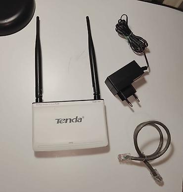Модемы и сетевое оборудование: Беспроводной компактный WiFi роутер/точка доступа TENDA N30 Wireless-N — 1