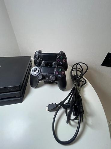 PS4 (Sony PlayStation 4): PlayStation 4 Pro (черный) Комплектация: - игровая консоль PS4 Pro — 5